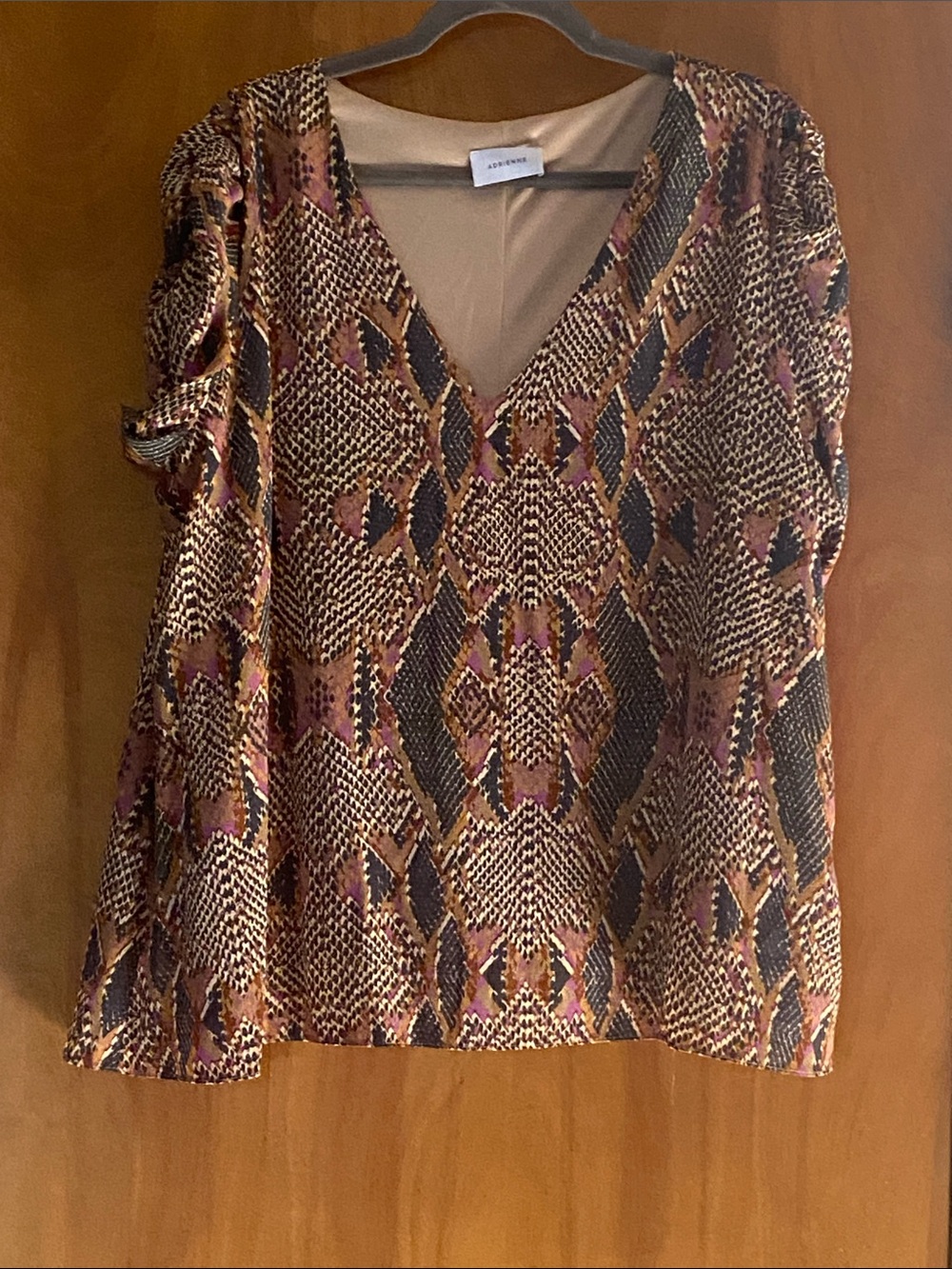 Lavendar, Black and cream v-neck snake print blouse